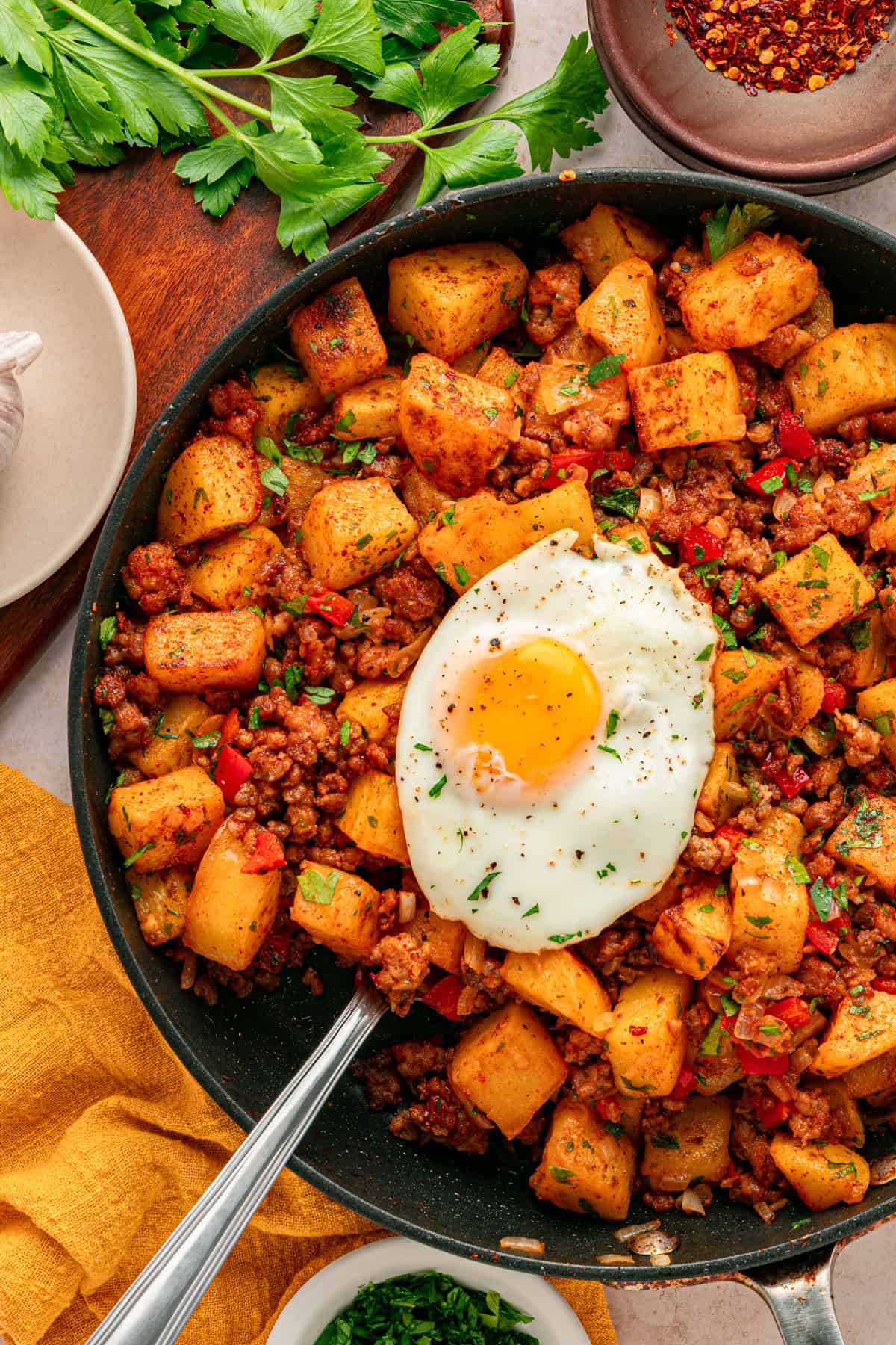 Overhead view of a skillet of chorizo and potatoes