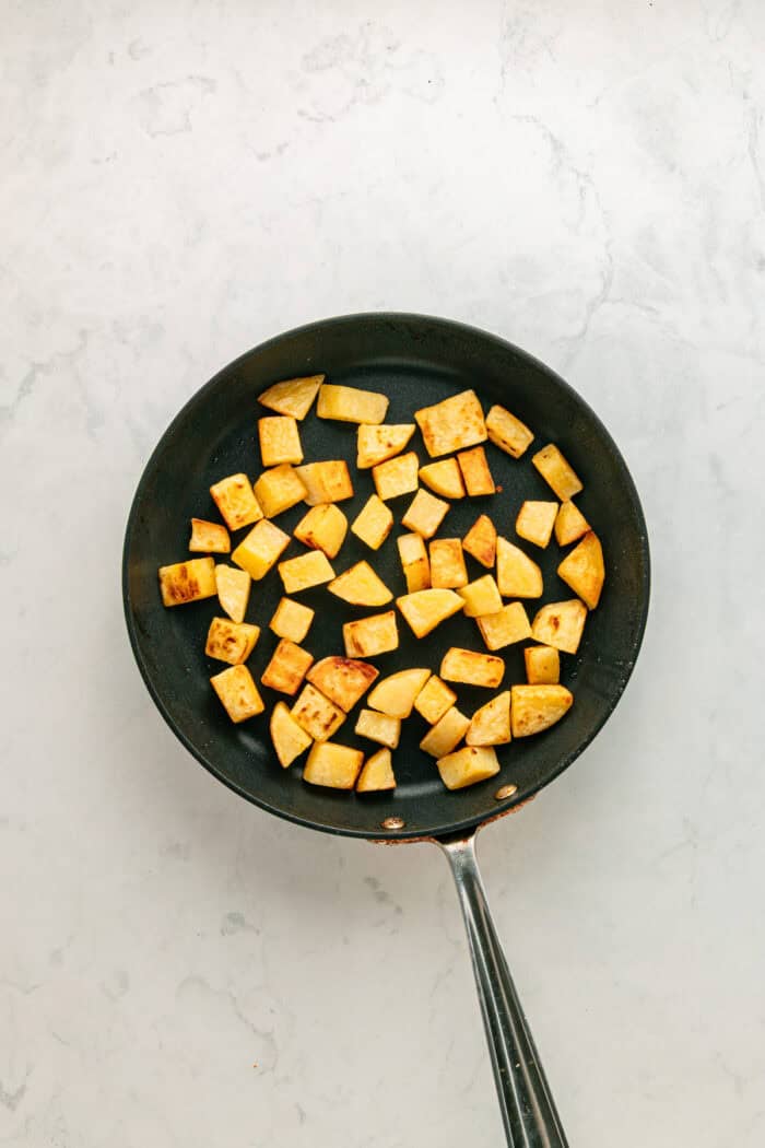 Diced potatoes in a skillet