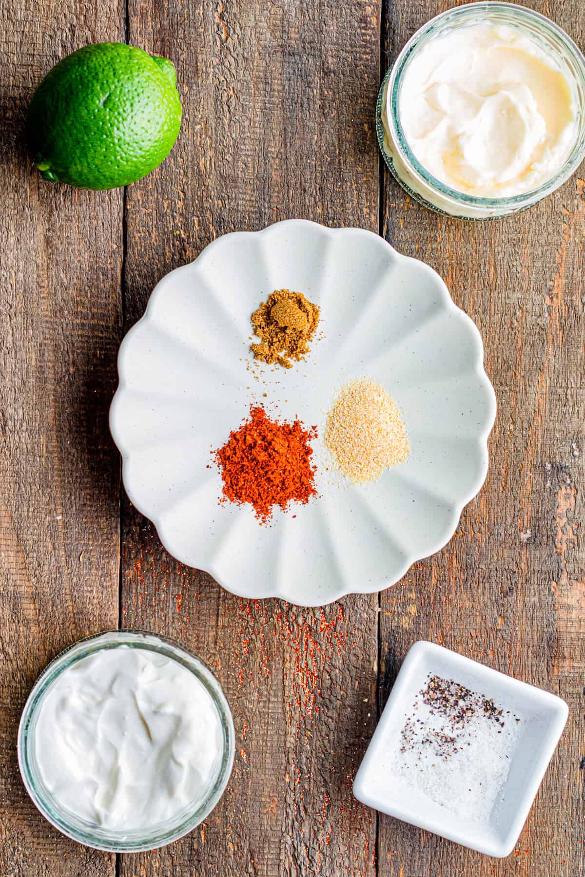 Overhead view of ingredients needed to make fish taco sauce