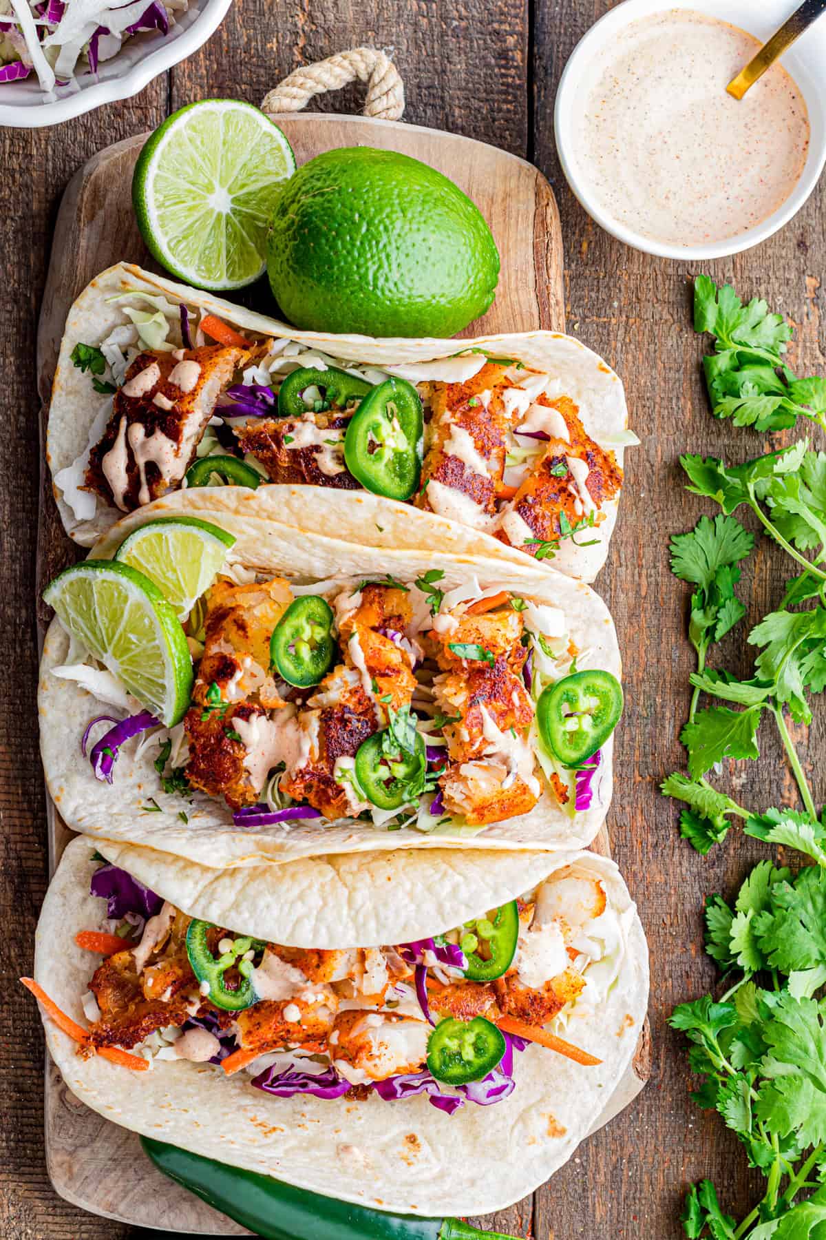Overhead view of three blackened fish tacos