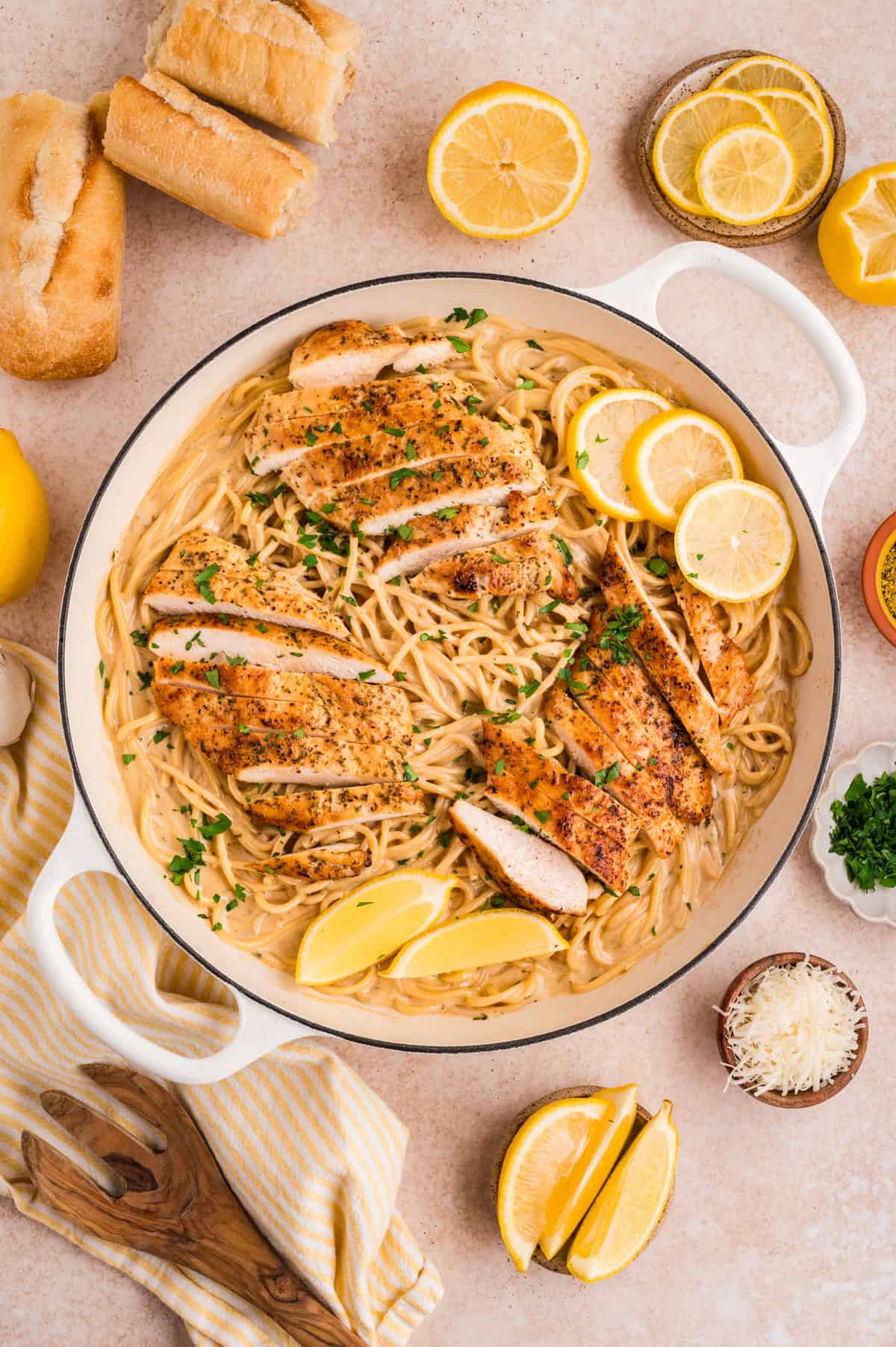 This Lemon Chicken Pasta is a quick, comforting dinner with bright citrus flavor and a rich, creamy sauce that feels restaurant-worthy. Overhead view of a pot of lemon chicken pasta