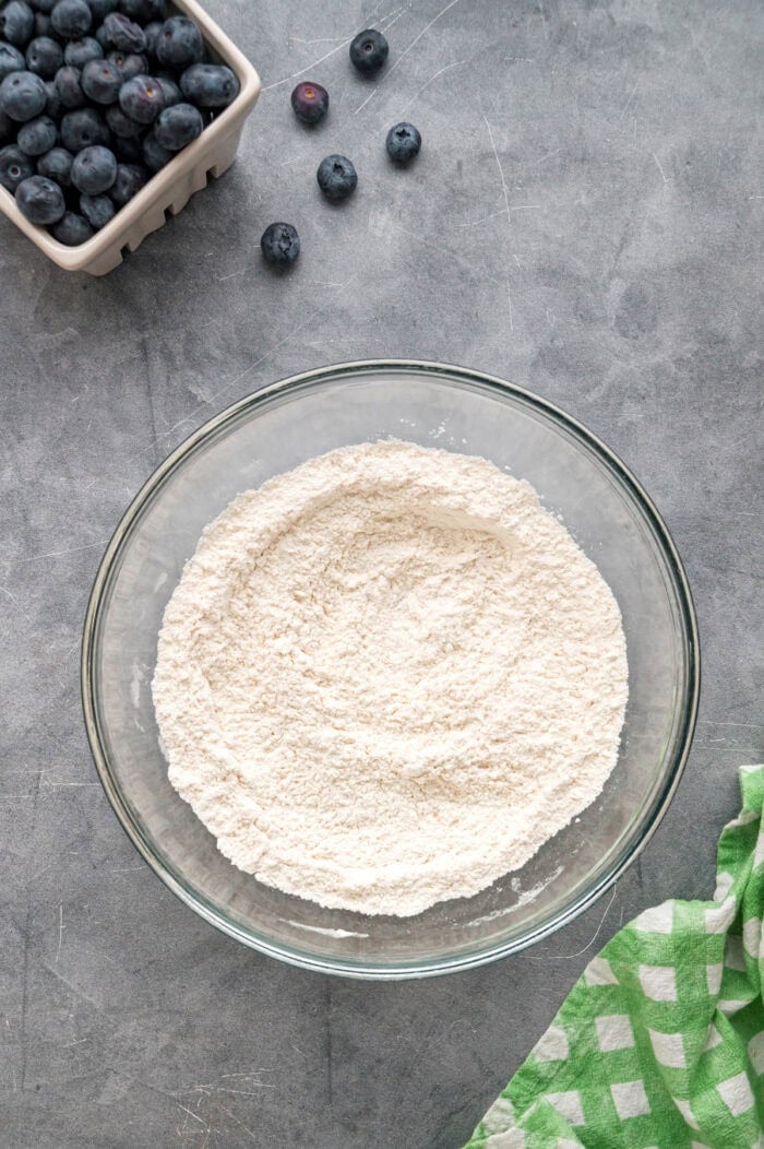 Made with just a handful of ingredients, these Cottage Cheese Pancakes are soft and filling with a lightly sweet flavor. Flour and baking soda in a bowl