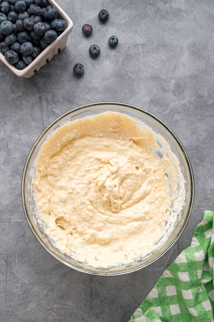 Made with just a handful of ingredients, these Cottage Cheese Pancakes are soft and filling with a lightly sweet flavor. Cottage cheese pancake batter in a bowl