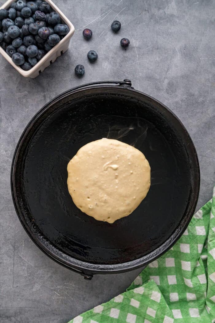 Made with just a handful of ingredients, these Cottage Cheese Pancakes are soft and filling with a lightly sweet flavor. Cottage cheese pancake batter in a skillet