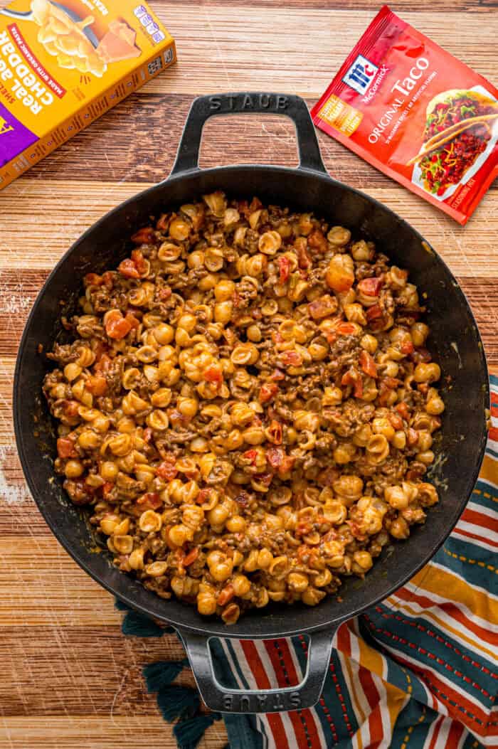 Overhead view of a skillet of taco mac and cheese