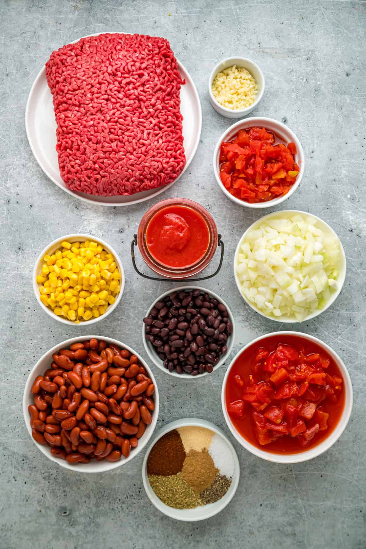 Overhead view of ingredients needed to make crockpot chili