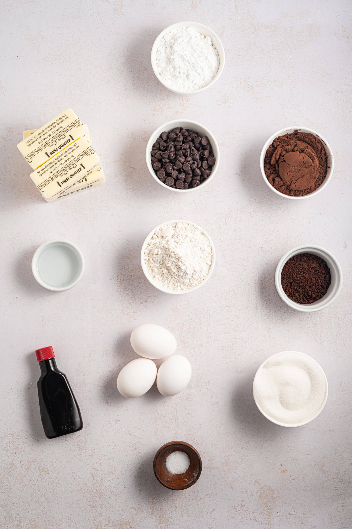 Espresso Brownies feature fudgy, dense chocolate brownies with a hint of espresso, topped with a layer of espresso buttercream frosting. Overhead view of ingredients needed to make espresso brownies