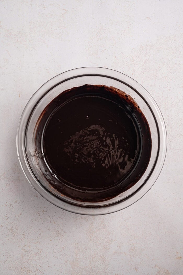 Espresso Brownies feature fudgy, dense chocolate brownies with a hint of espresso, topped with a layer of espresso buttercream frosting. Chocolate brownie mixture in a bowl