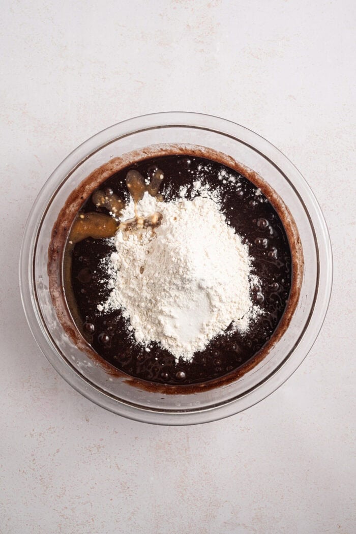 Espresso Brownies feature fudgy, dense chocolate brownies with a hint of espresso, topped with a layer of espresso buttercream frosting. Flour added to brownie batter