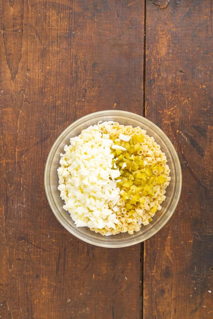 Ditalini, diced egg whites, and pickles in a bowl