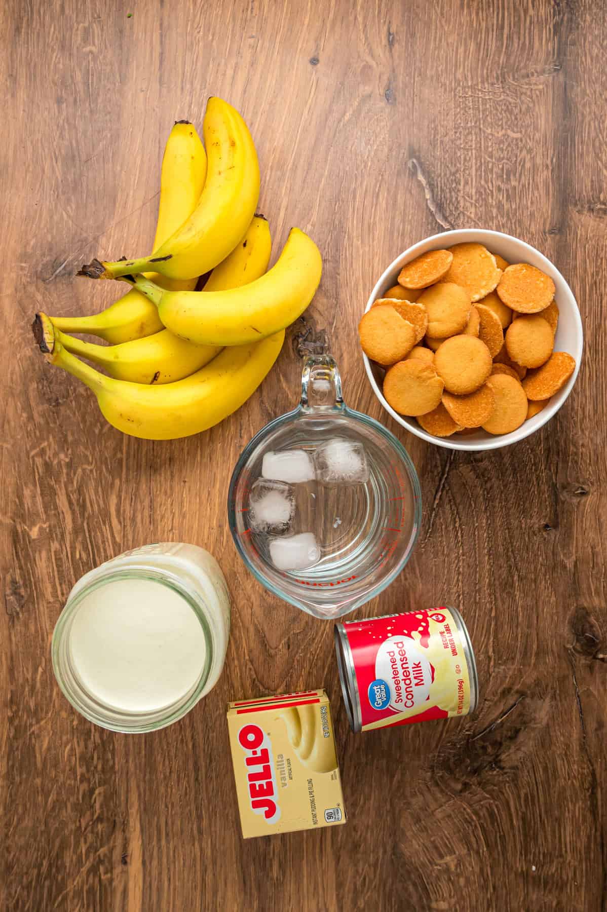 With light, airy layers of pudding, fresh banana slices, and Nilla wafers, this Magnolia Bakery Banana Pudding Recipe is an exact copycat. Overhead view of ingredients needed to make Magnolia Bakery banana pudding recipe