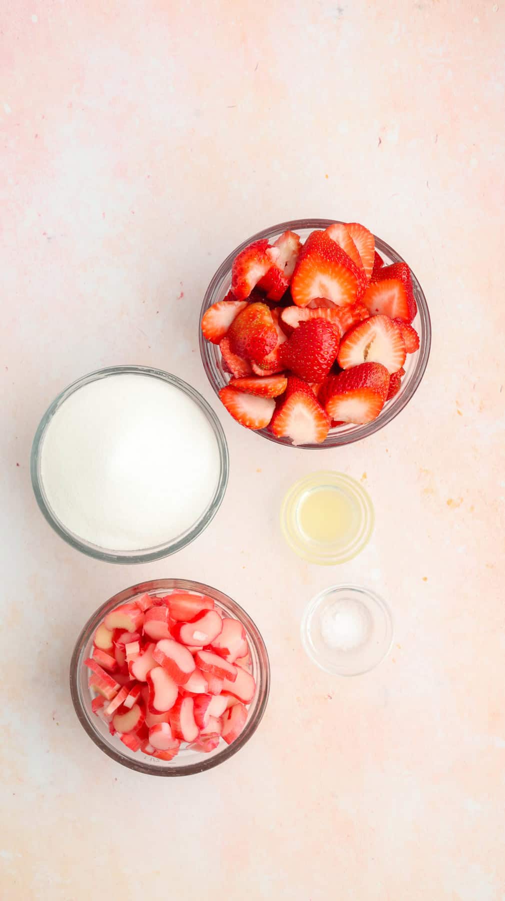 Overhead view of ingredients needed to make strawberry rhubarb jam
