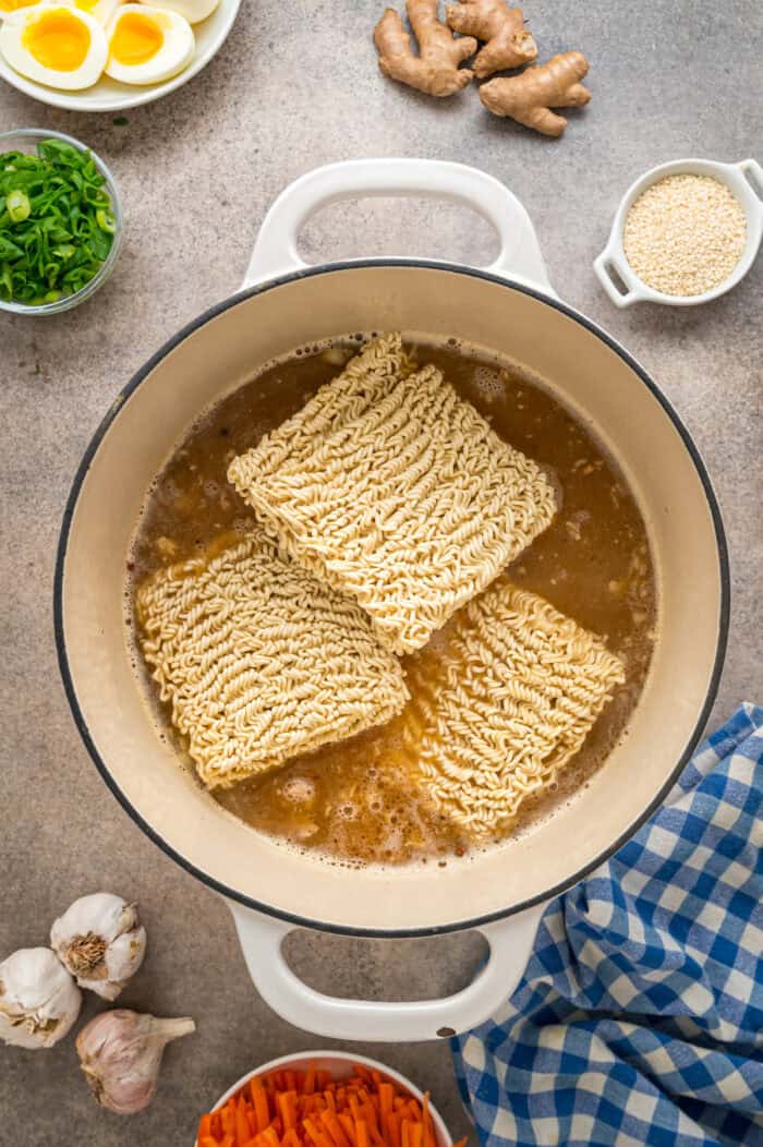 This easy Chicken Ramen recipe turns instant ramen noodles into a flavorful and filling weeknight dinner. Ready in 35 minutes! Three packs of instant ramen noodles added to the broth