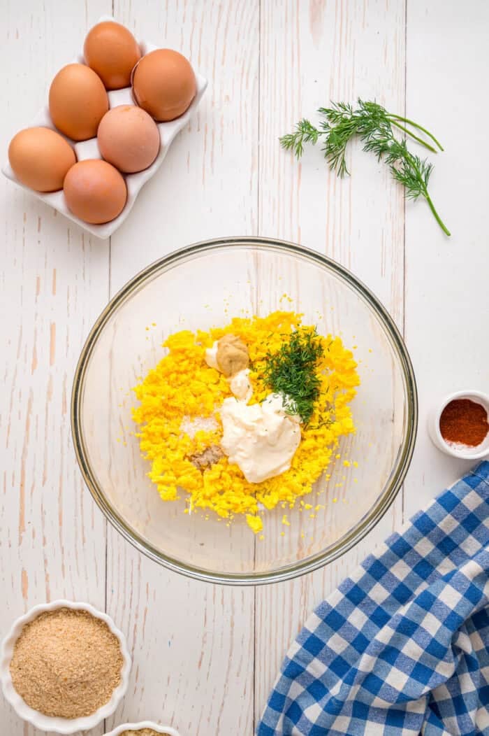 Fried Deviled Eggs are a fun twist on the classic, with hard-boiled egg whites coated in breadcrumbs and deep-fried. Mayonnaise and dill added to mashed egg yolks