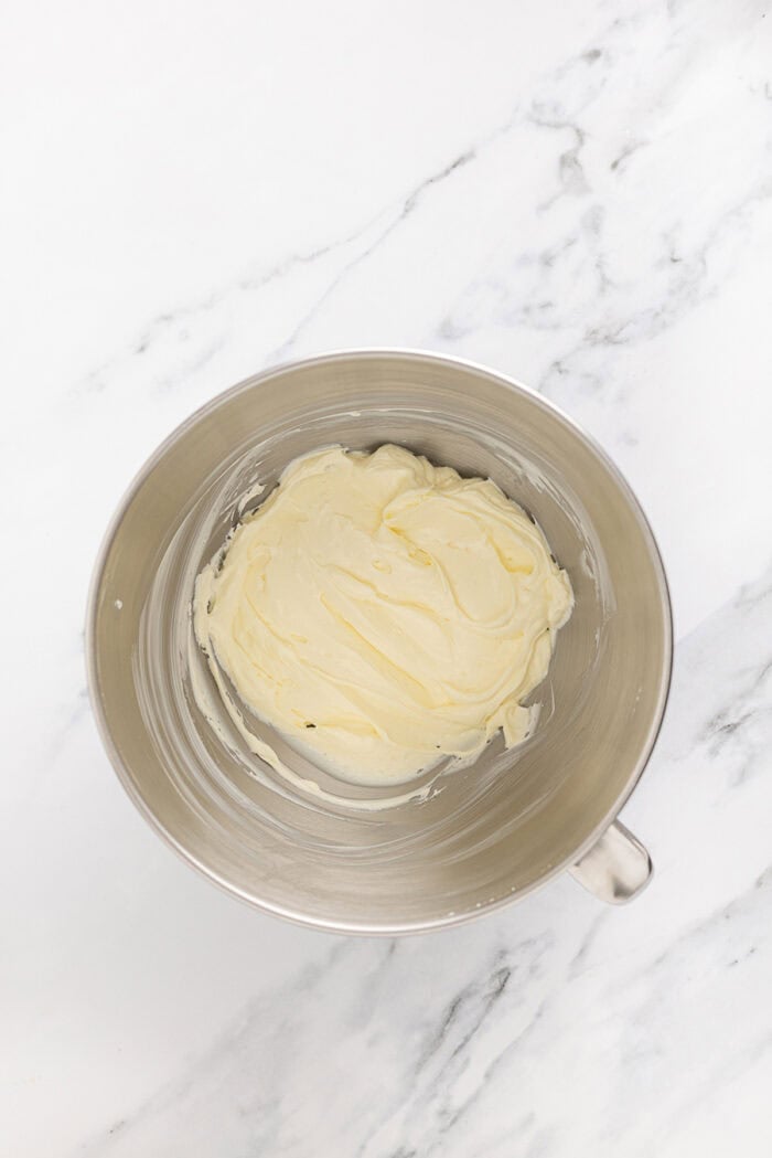 Creamed cream cheese and butter in a mixing bowl
