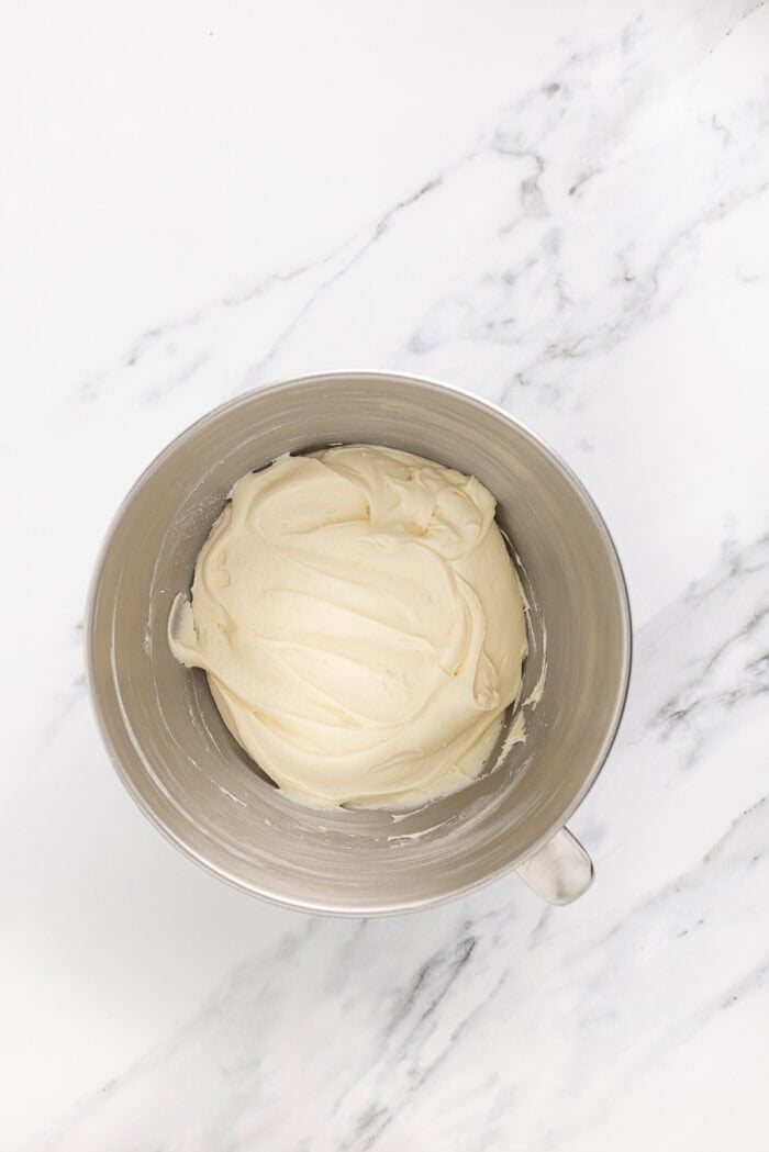 Cream cheese frosting in a mixing bowl