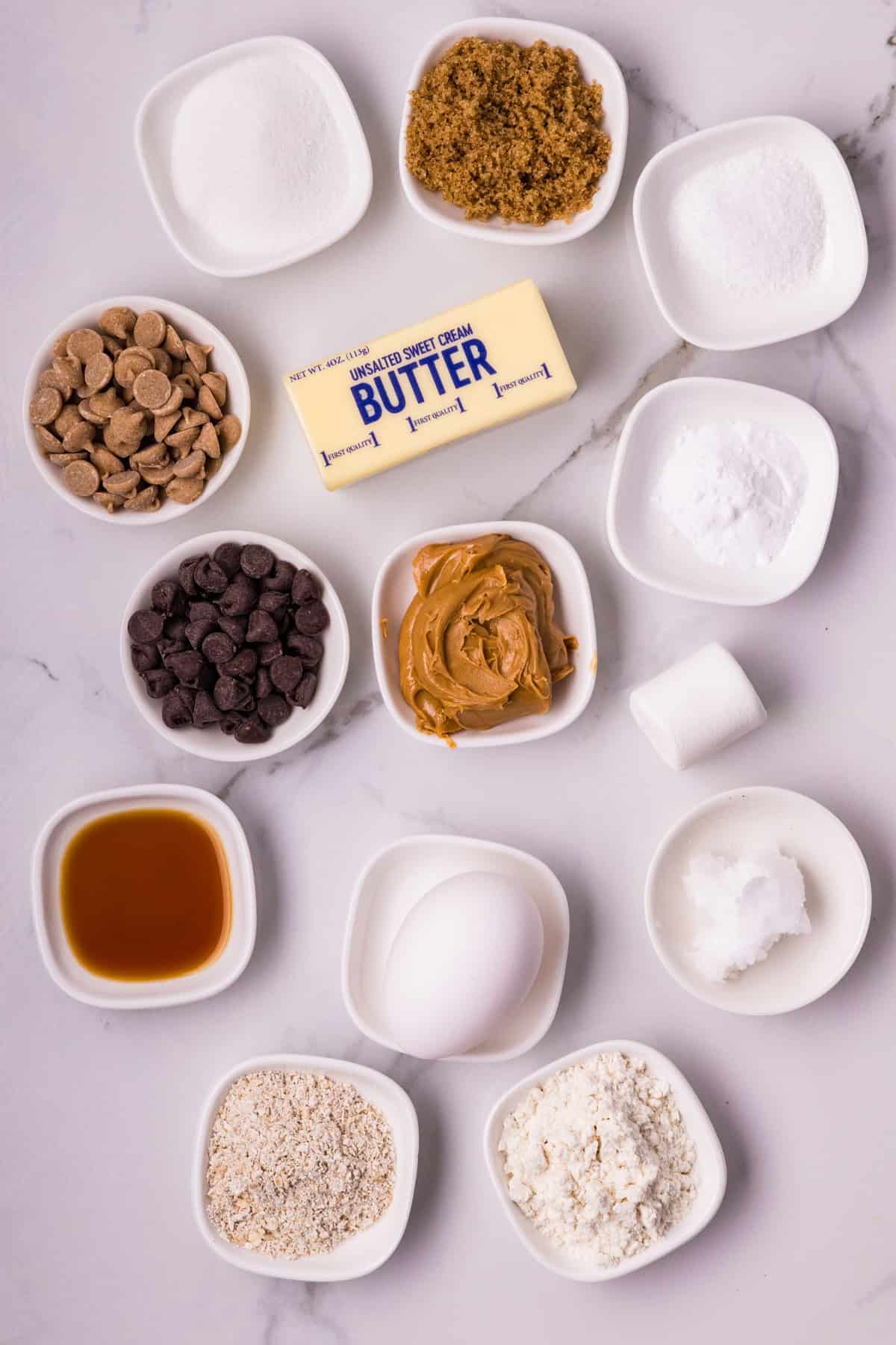These soft and chewy Peanut Butter Marshmallow Cookies are loaded with rich peanut butter flavor and a marshmallow surprise. Overhead view of ingredients needed to make peanut butter marshmallow cookies