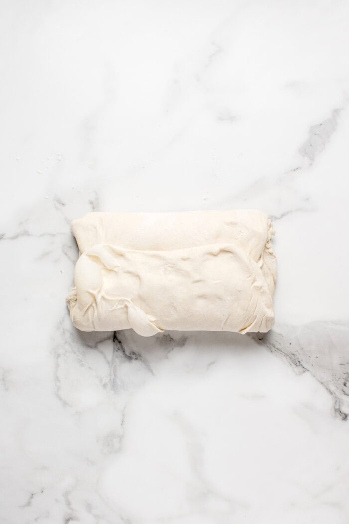 Made with an active sourdough starter, pantry staples, and a simple process, this Sourdough Bread recipe is perfect for beginners. The dough folded into third