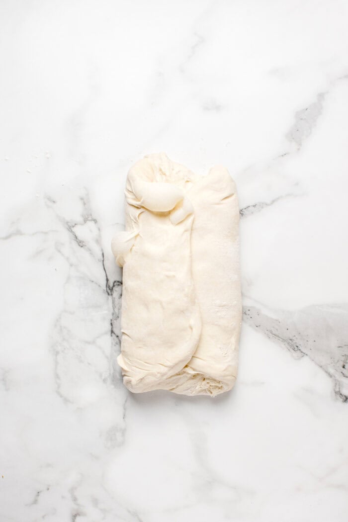 Made with an active sourdough starter, pantry staples, and a simple process, this Sourdough Bread recipe is perfect for beginners. The dough folded like a burrito