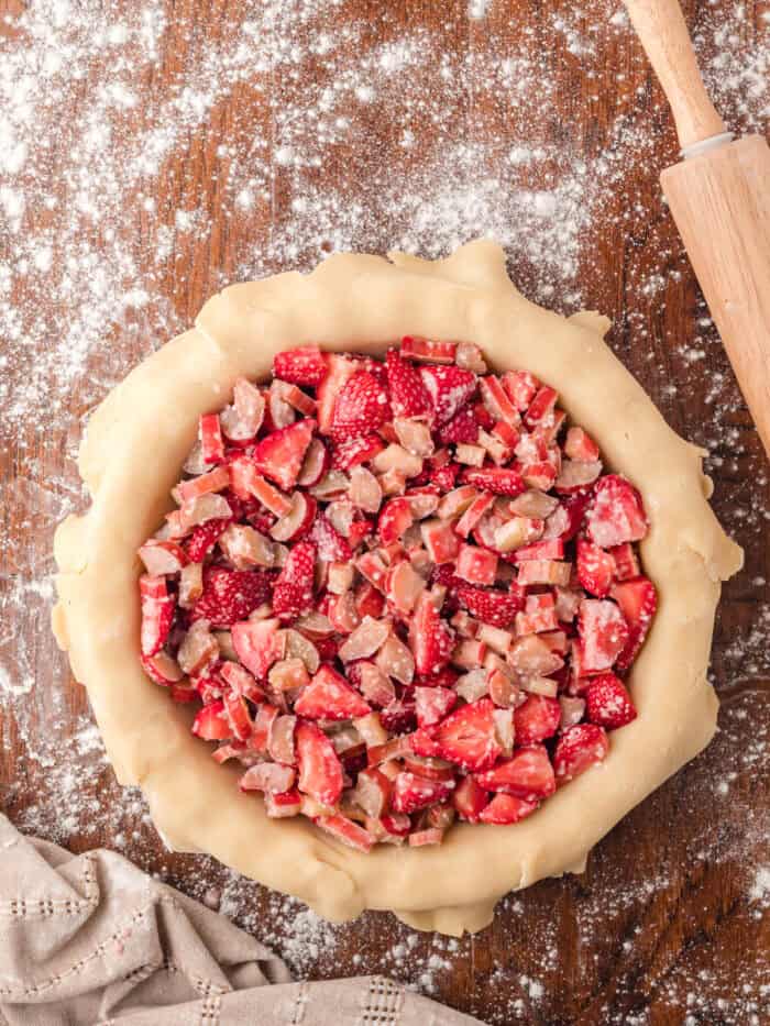 Strawberry rhubarb filling in a pie crust