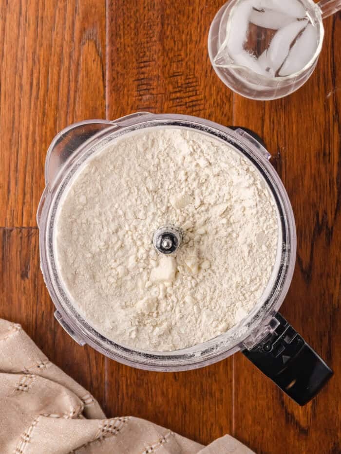 Flour and sugar in a food processor