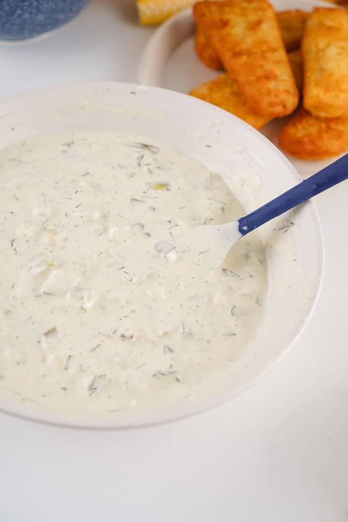 This easy Homemade Tartar Sauce recipe combines fresh dill, mayo, and pickles to create a creamy, tangy dip for seafood. Homemade tartar sauce in a bowl