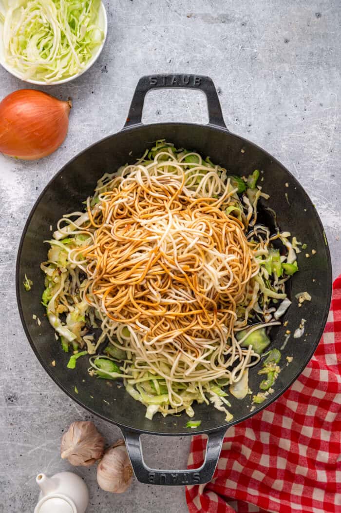 With tender noodles coated in a savory sauce and crunchy veggies, this copycat Panda Express Chow Mein tastes even better than takeout. Cooked chow mein noodles added to the pan with the veggies.