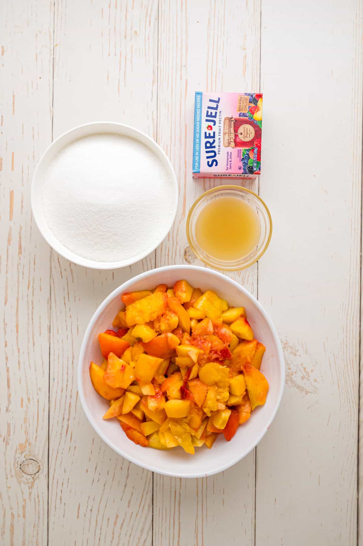 Overhead view of ingredients needed to make peach jam