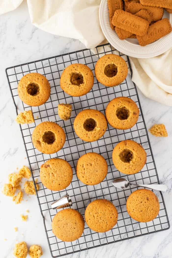 These Biscoff Cupcakes are soft, ultra-moist, and packed with warm caramelized flavor from cookie butter in both the batter and frosting. Biscoff cupcakes with the center removed