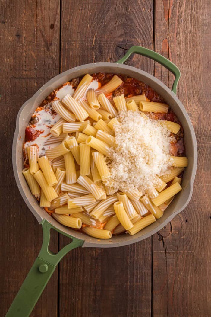 Italian Sausage Pasta is ready in just 30 minutes with a handful of ingredients. Creamy, decadent, and flavorful! Pasta, cream, and parmesan added to the sausage and tomato sauce
