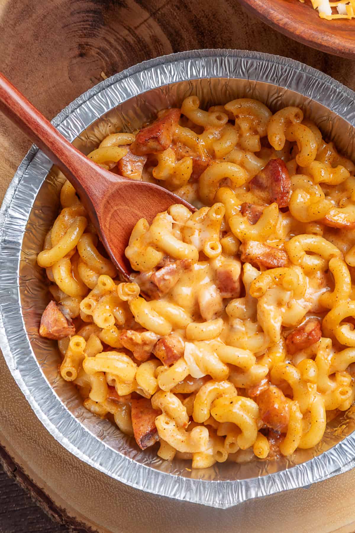 Macaroni and smoked sausage are tossed with a thick, creamy alfredo sauce base and lots of cheese to make this Easy Sausage Mac and Cheese. top view of Sausage Mac & Cheese