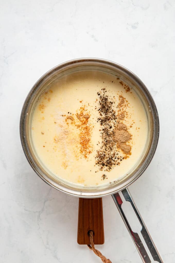 Tender penne, shredded chicken, and broccoli are tossed in a from-scratch sauce that's rich and garlicky in this Chicken Broccoli Alfredo. Seasonings added to alfredo sauce