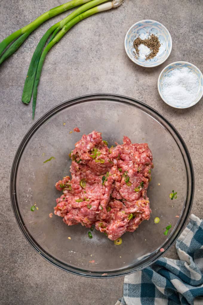 With a savory ground pork filling and crispy golden outside, this Fried Wonton recipe brings Chinese takeout to the table in 30 minutes. Ground pork mixture in a bowl
