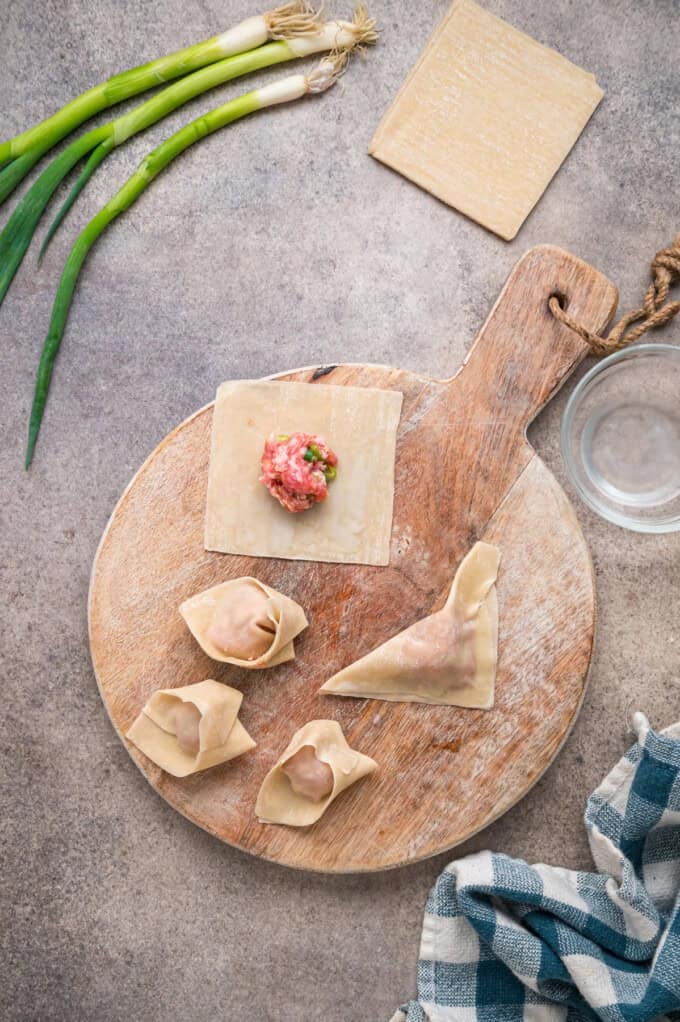 With a savory ground pork filling and crispy golden outside, this Fried Wonton recipe brings Chinese takeout to the table in 30 minutes. Pork filling on wonton wrappers