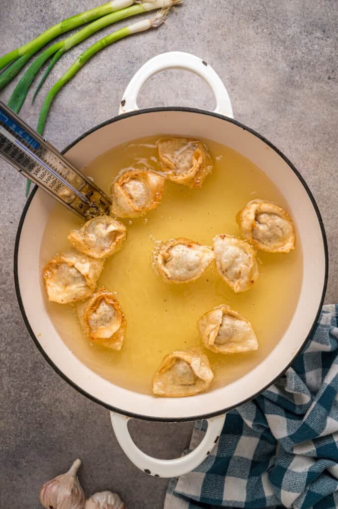 With a savory ground pork filling and crispy golden outside, this Fried Wonton recipe brings Chinese takeout to the table in 30 minutes. Fried pork wontons in the pan
