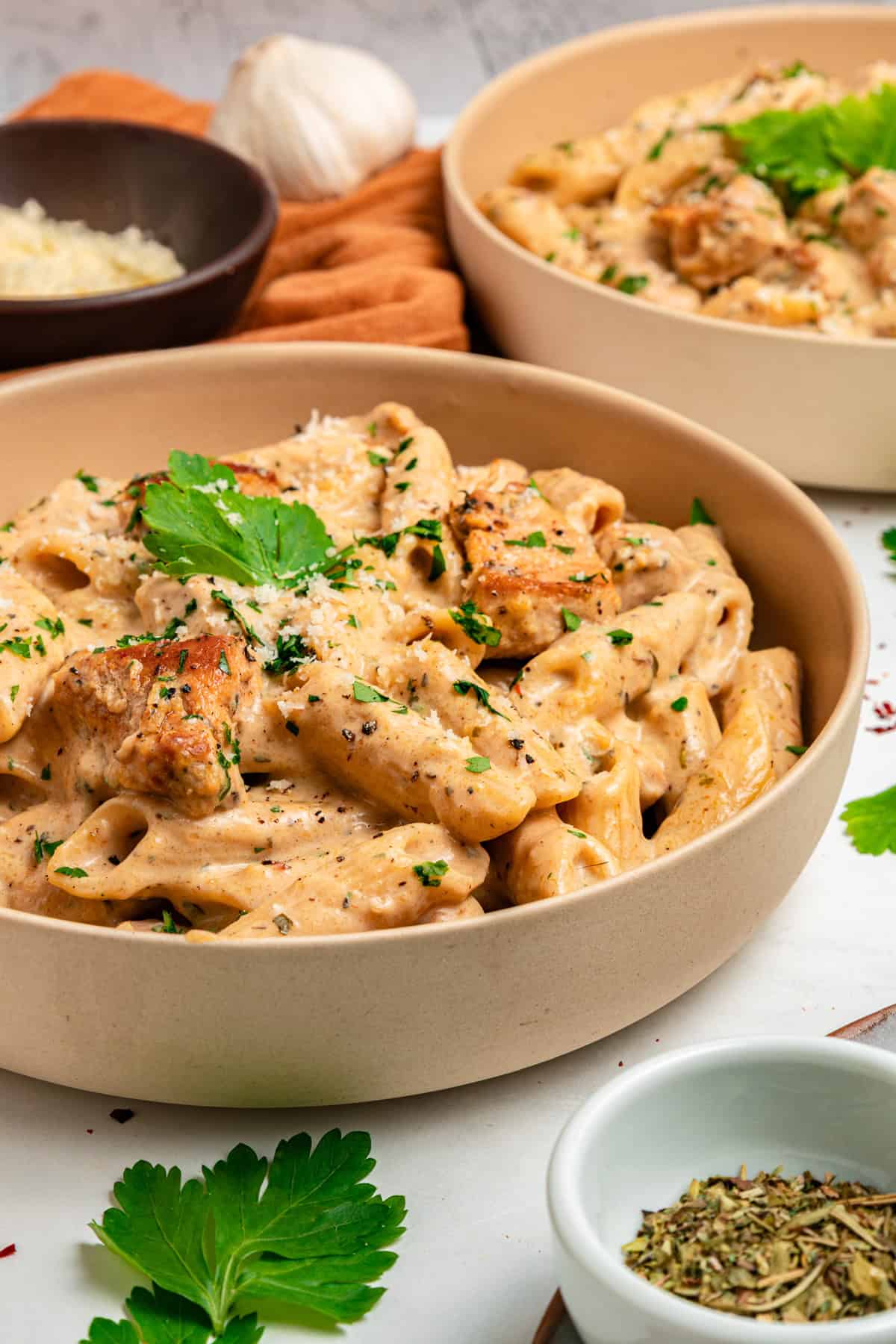 With tender, juicy chicken coated in a creamy garlic sauce, this Garlic Parmesan Chicken Pasta is an easy weeknight dinner. A bowl of garlic parmesan chicken pasta