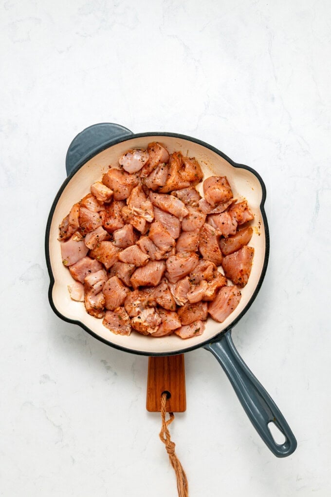 With tender, juicy chicken coated in a creamy garlic sauce, this Garlic Parmesan Chicken Pasta is an easy weeknight dinner. Bite-sized pieces of chicken in a pan