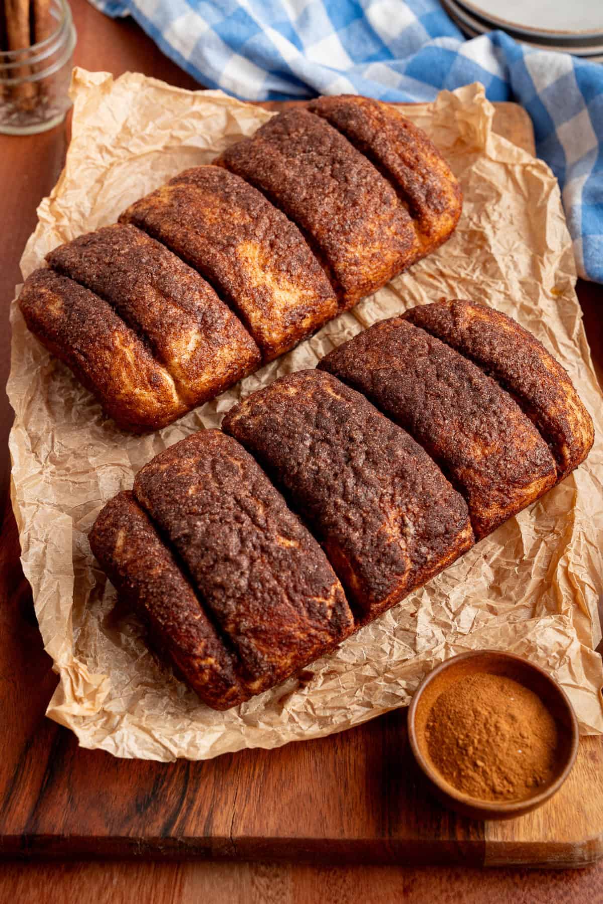 This Dollywood Cinnamon Bread copycat recipe has a buttery, caramelized cinnamon-sugar coating and sweet glaze drizzled over the top. Baked Dollywood Cinnamon Bread