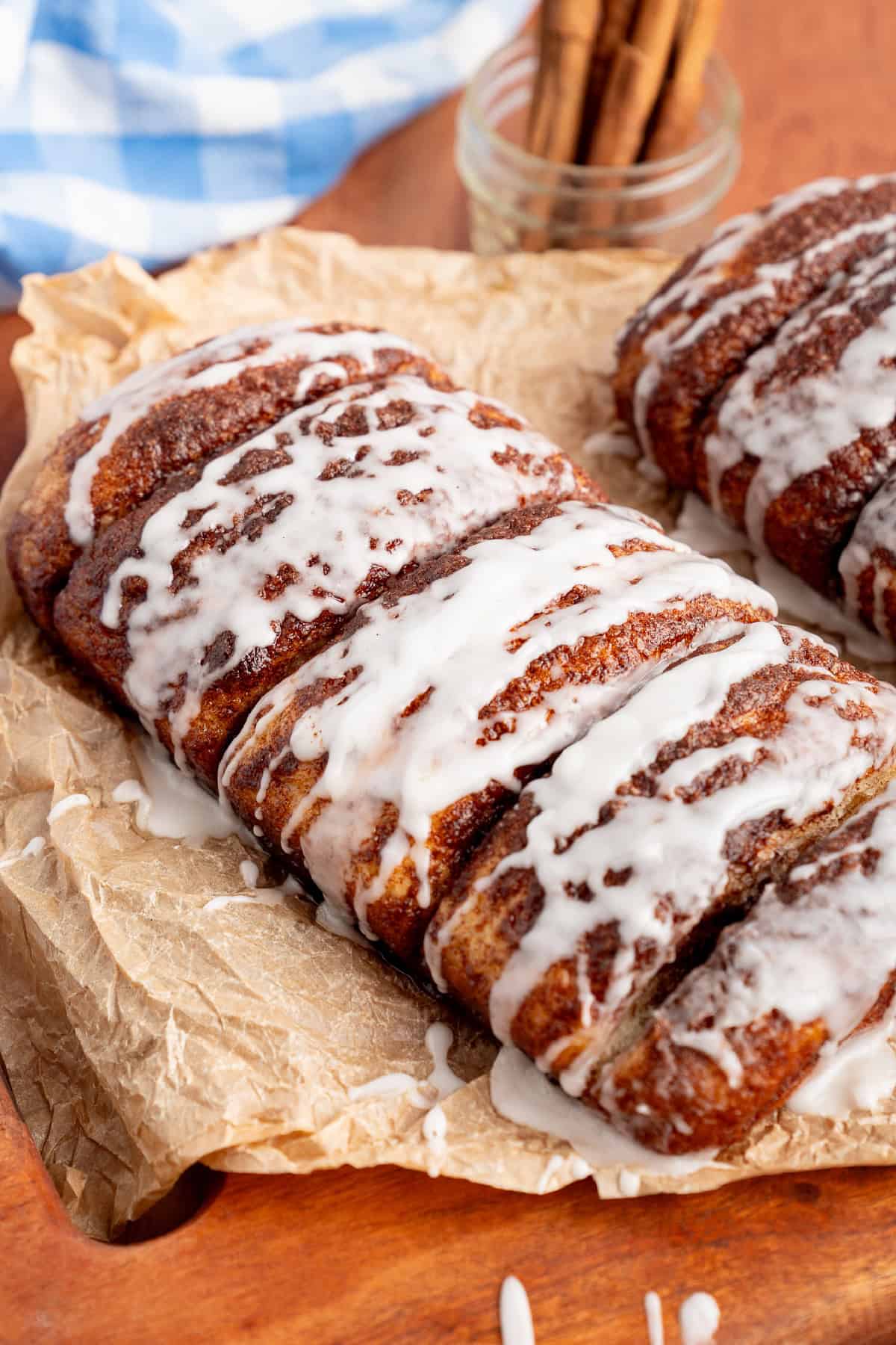 This Dollywood Cinnamon Bread copycat recipe has a buttery, caramelized cinnamon-sugar coating and sweet glaze drizzled over the top. Baked Dollywood Cinnamon Bread with icing