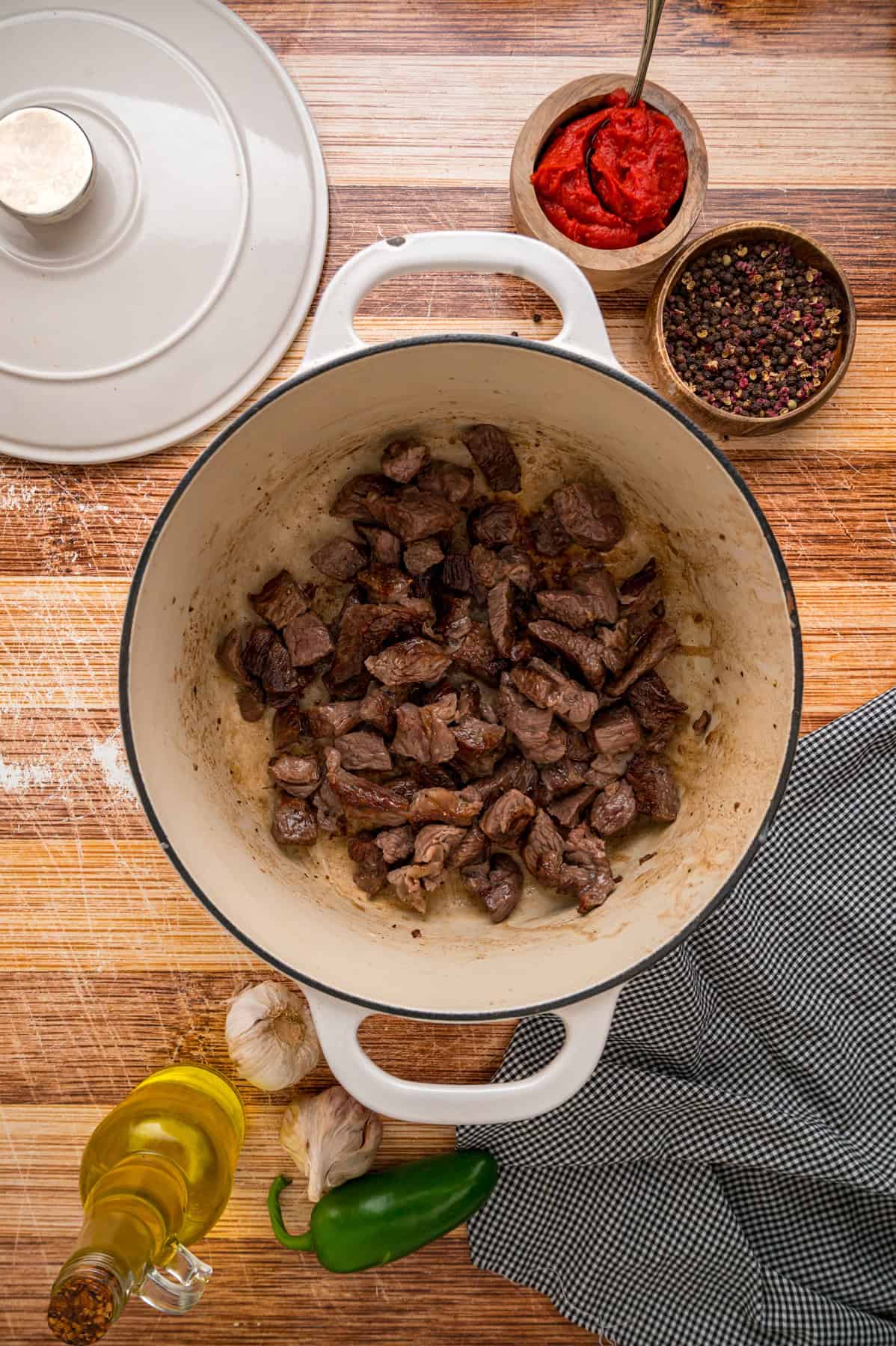 Chunks of chuck roast in a pot
