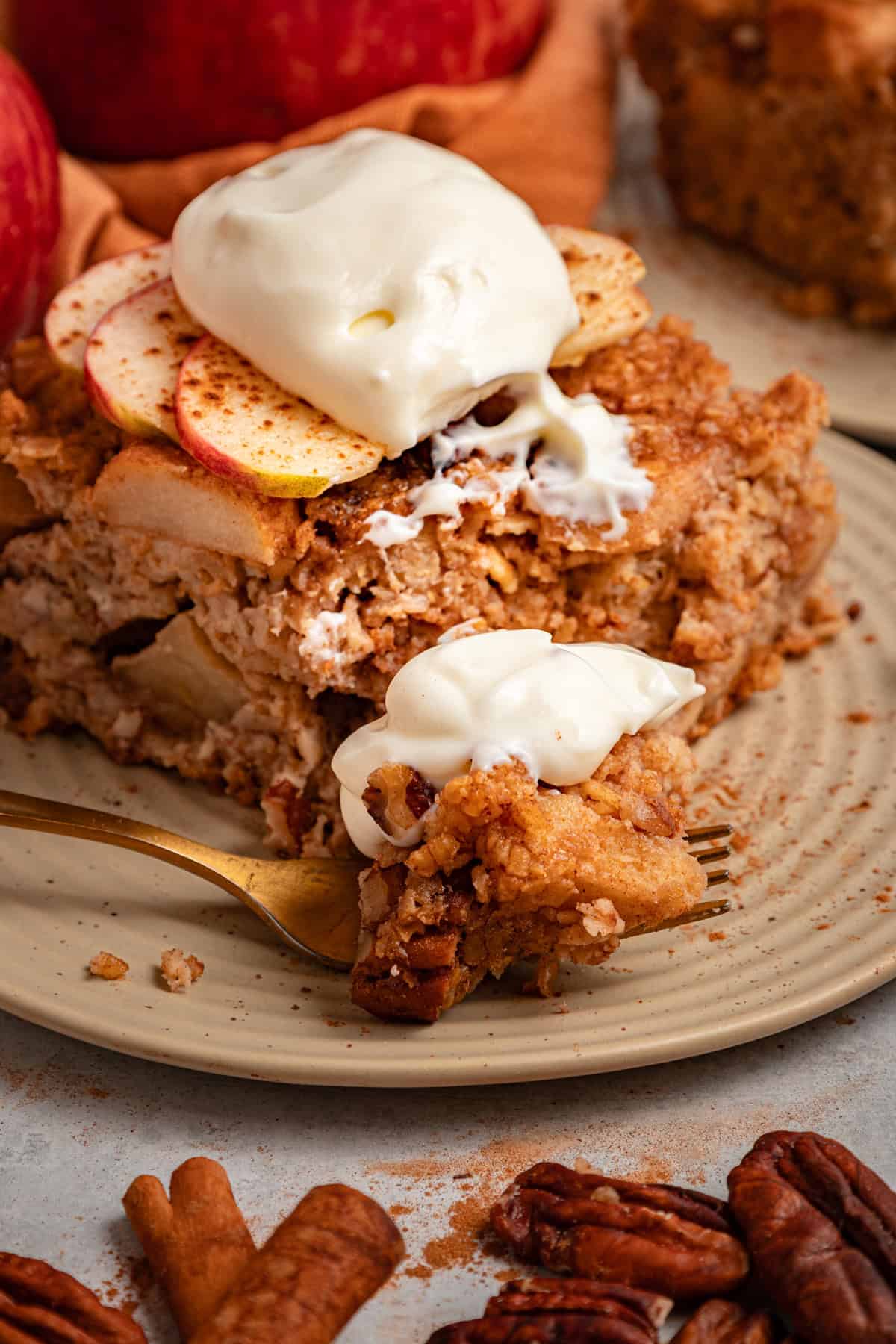 With tender, caramelized apples and lightly spiced maple syrup oats, this Baked Apple Oatmeal is the perfect fall breakfast. A plate of baked apple oatmeal