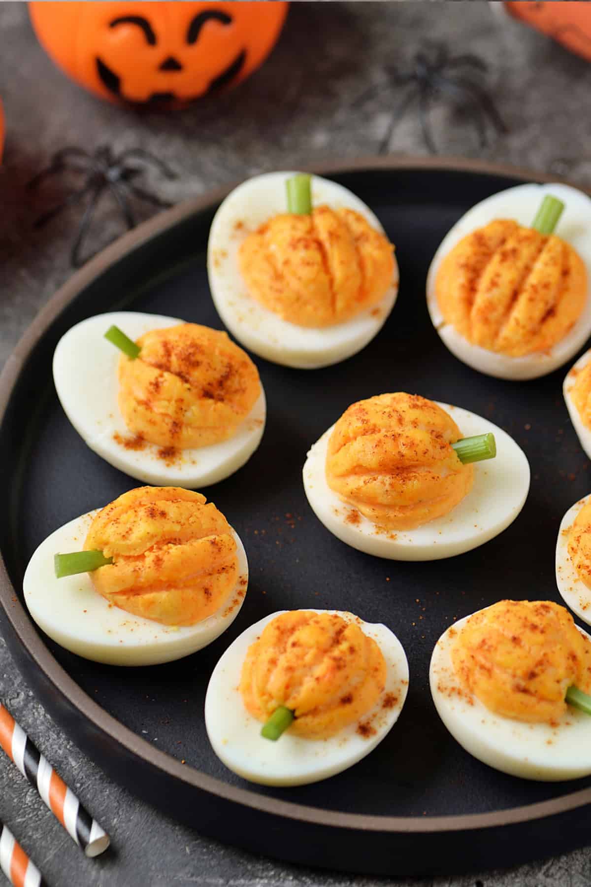 These Halloween Deviled Eggs are a fun and spooky appetizer for Halloween parties! Halloween Pumpkin Deviled Eggs
