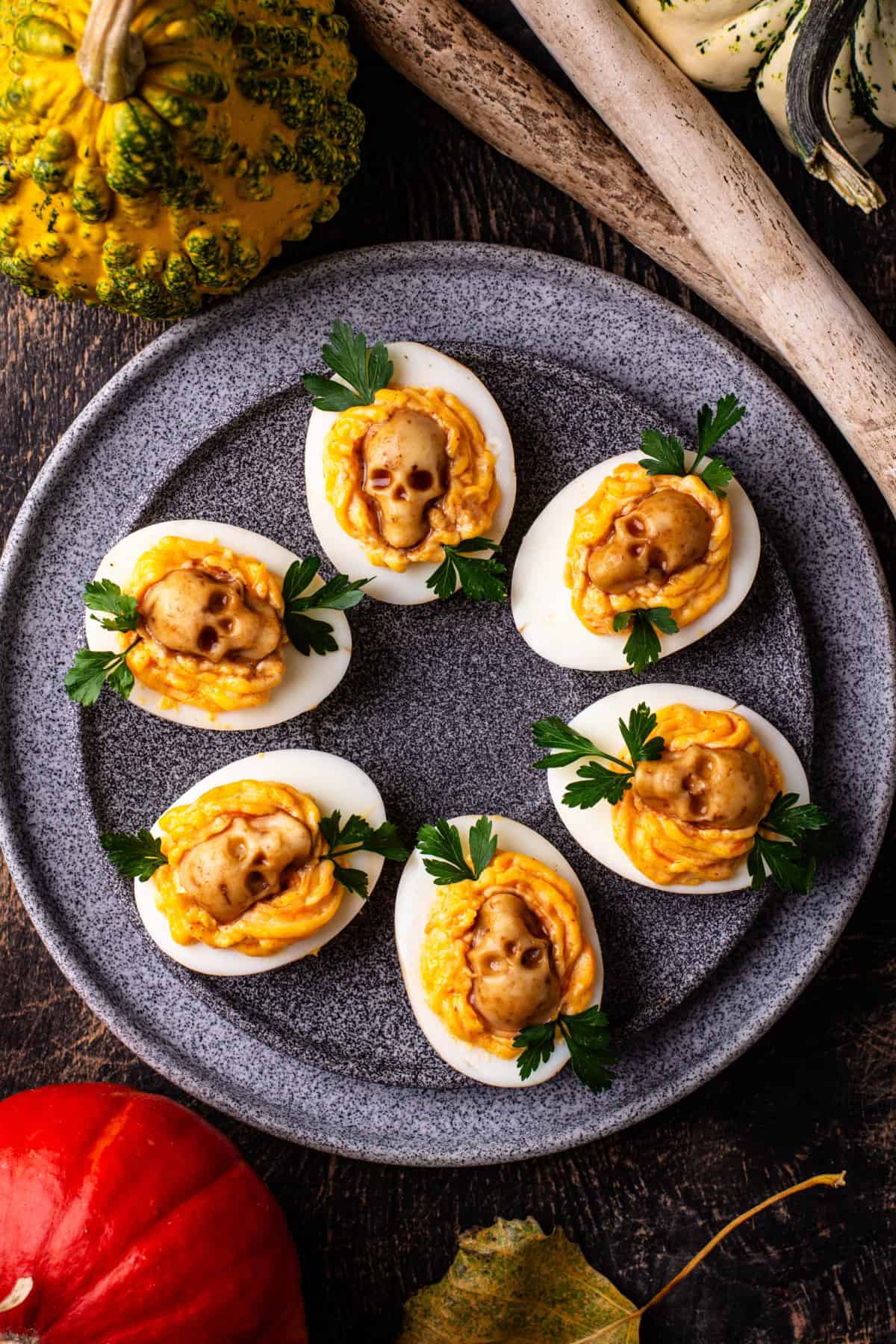 These Halloween Deviled Eggs are a fun and spooky appetizer for Halloween parties! Halloween Skull Deviled Eggs