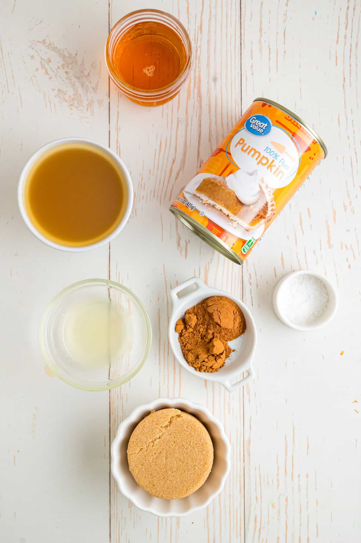 Made with pumpkin puree, brown sugar, maple syrup, and warm spices, you’ll want to spread this Pumpkin Butter on everything. Overhead view of ingredients to make pumpkin butter