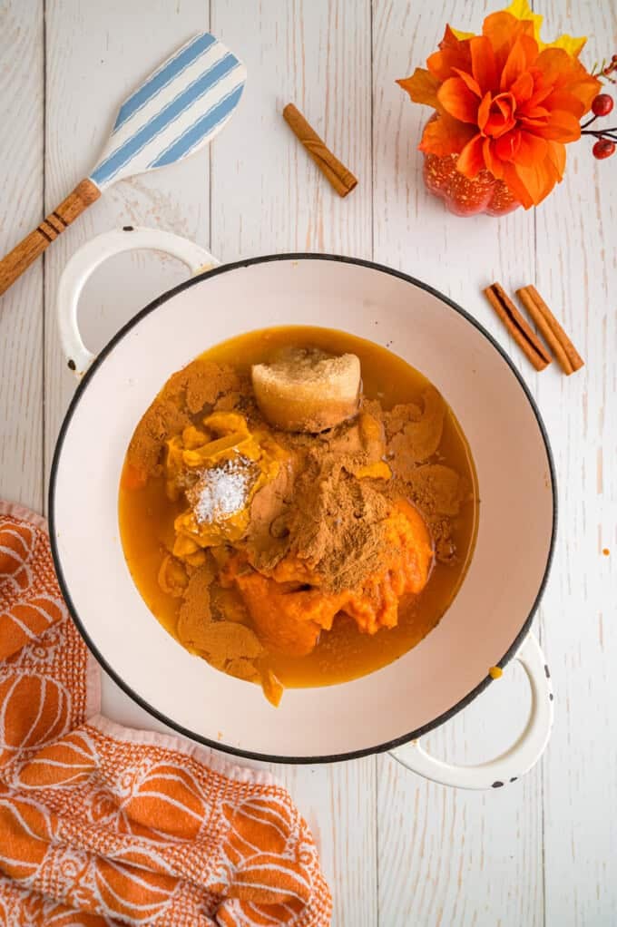 Made with pumpkin puree, brown sugar, maple syrup, and warm spices, you’ll want to spread this Pumpkin Butter on everything. Pumpkin butter ingredients in a pan