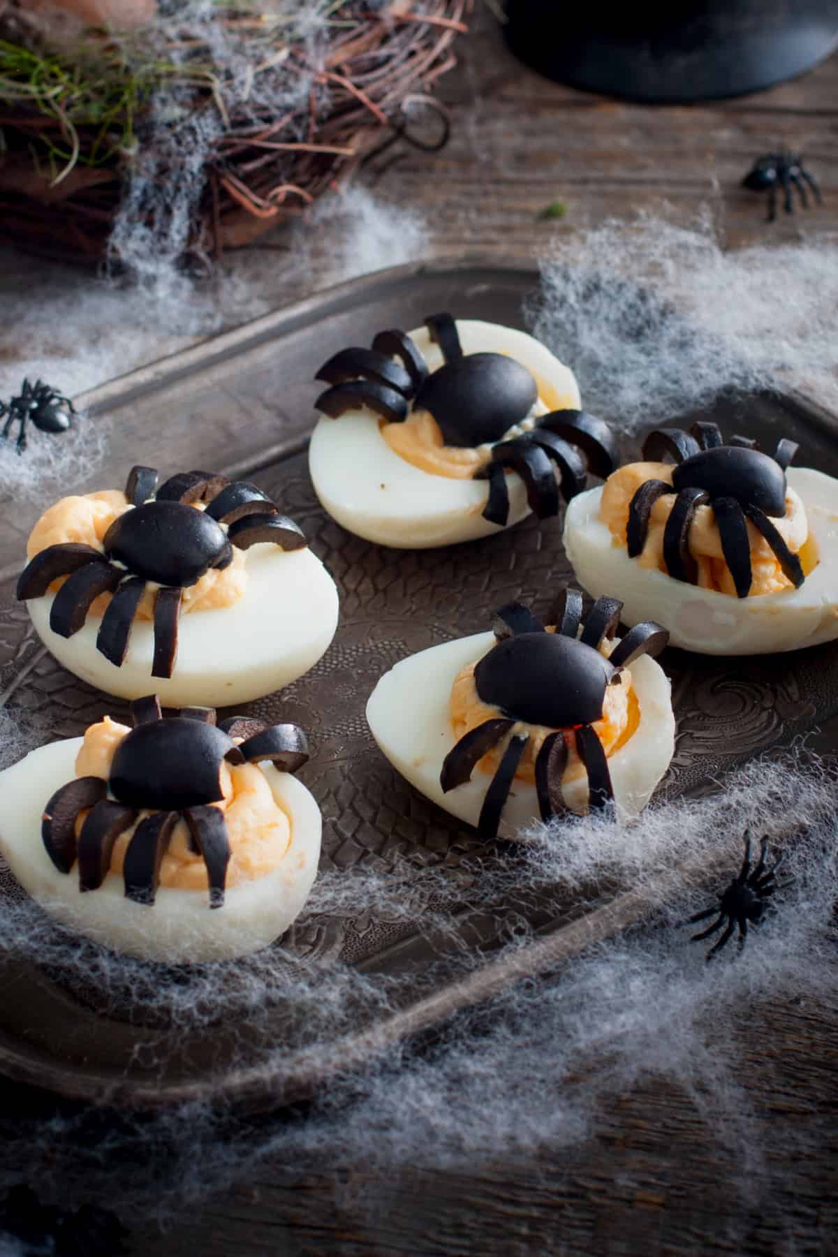 These Halloween Deviled Eggs are a fun and spooky appetizer for Halloween parties! Halloween Spider Eggs