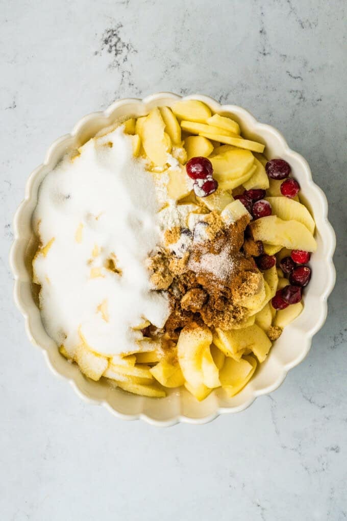 This Apple Cranberry Crisp is baked in a cast-iron skillet, giving the fruit a caramelized edge while the buttery oat turns golden & crunchy. Sugar added to apples and cranberries