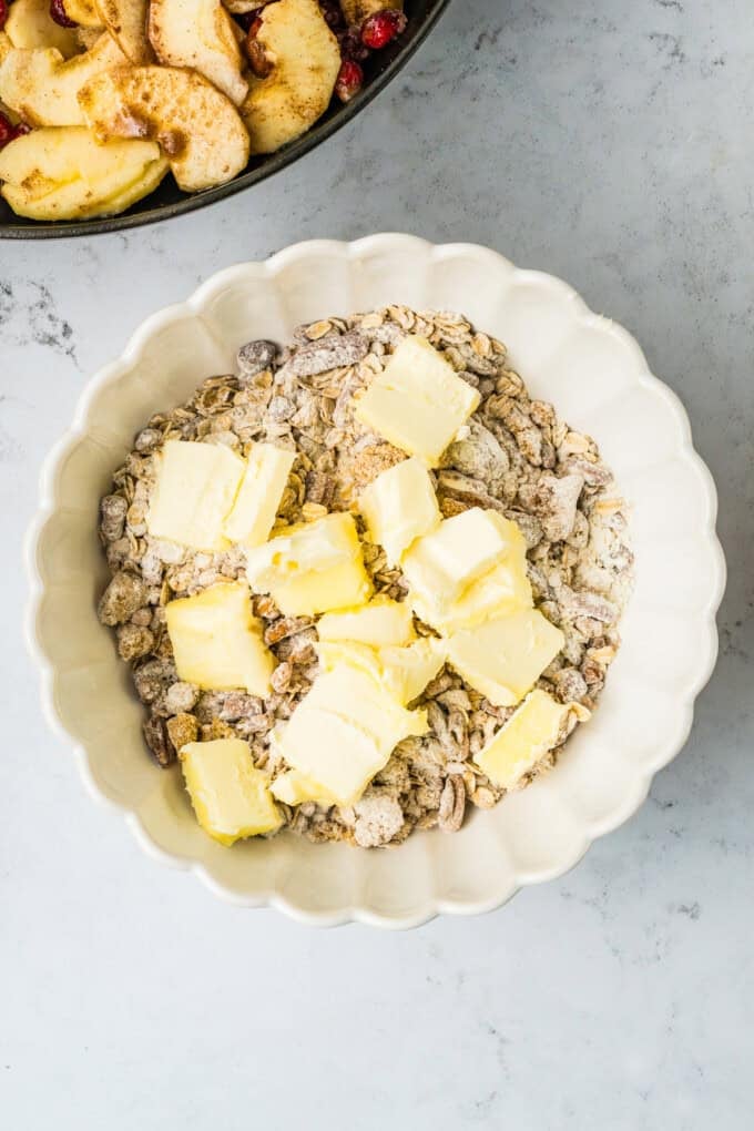 This Apple Cranberry Crisp is baked in a cast-iron skillet, giving the fruit a caramelized edge while the buttery oat turns golden & crunchy. Butter added to flour and sugar