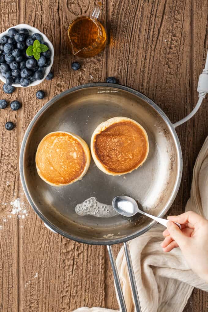 These Japanese Soufflé Pancakes are tall, fluffy, jiggly, and unbelievably soft, thanks to the meringue in the batter. Adding water to partially cooked Japanese souffle pancakes