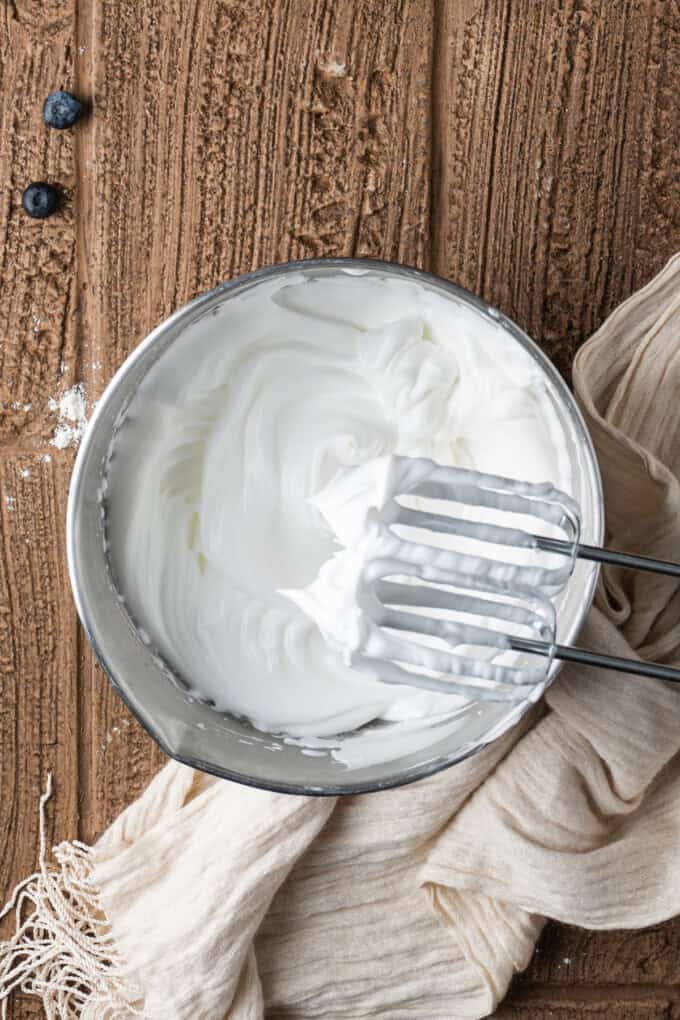 These Japanese Soufflé Pancakes are tall, fluffy, jiggly, and unbelievably soft, thanks to the meringue in the batter. Meringue in a mixing bowl